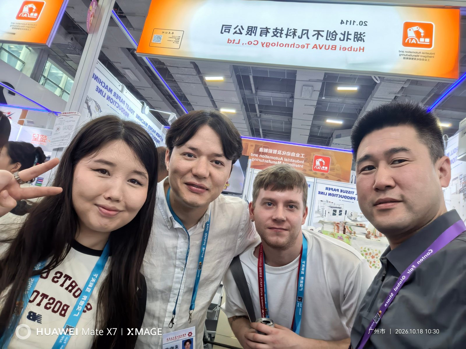 BUVA team with international buyers at the 140th Canton Fair booth
